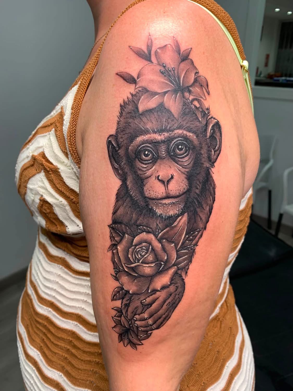 Black & grey monkey with roses — fine detail portrait