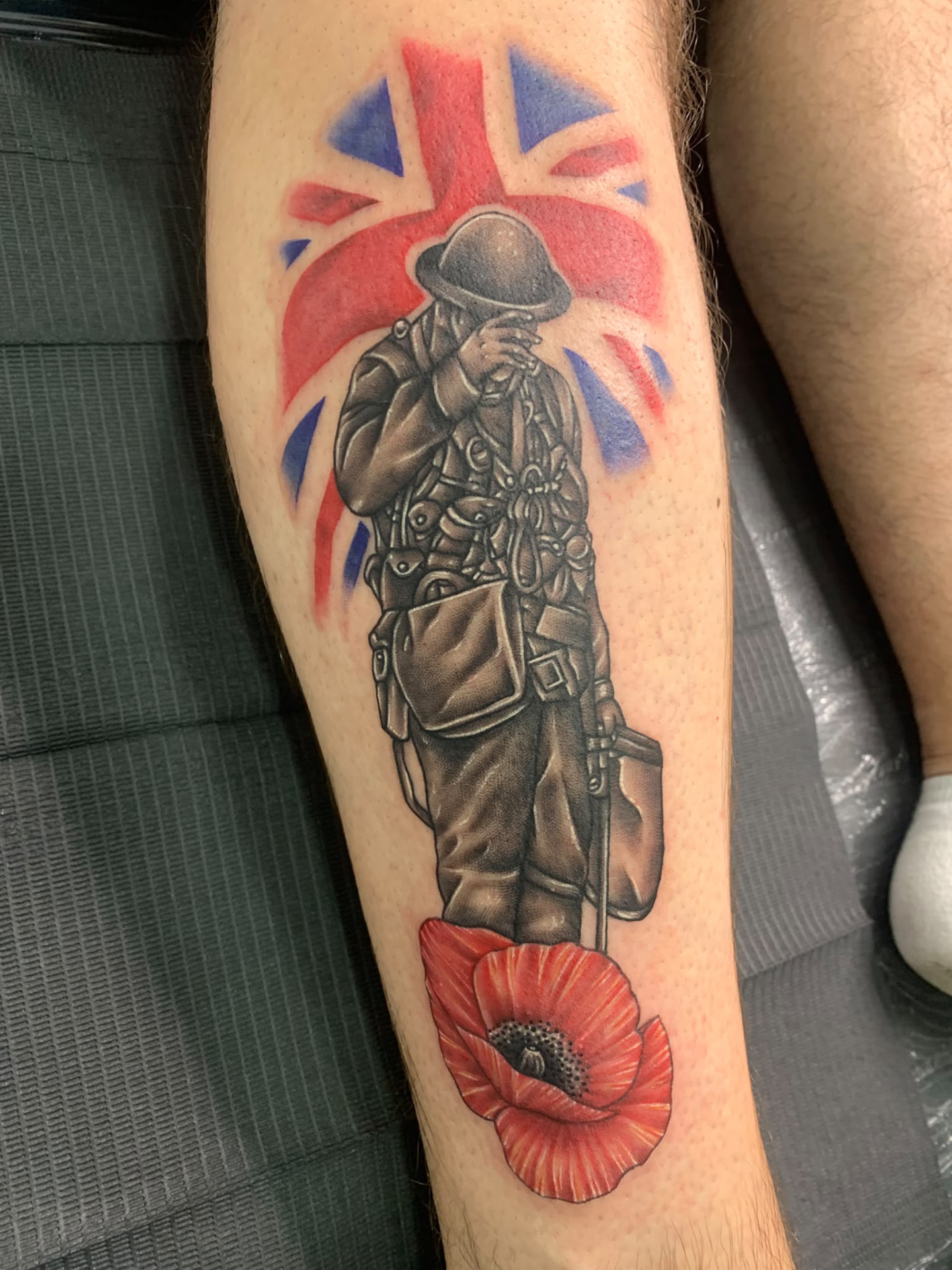 Poppy & soldier tribute with Union Jack backdrop