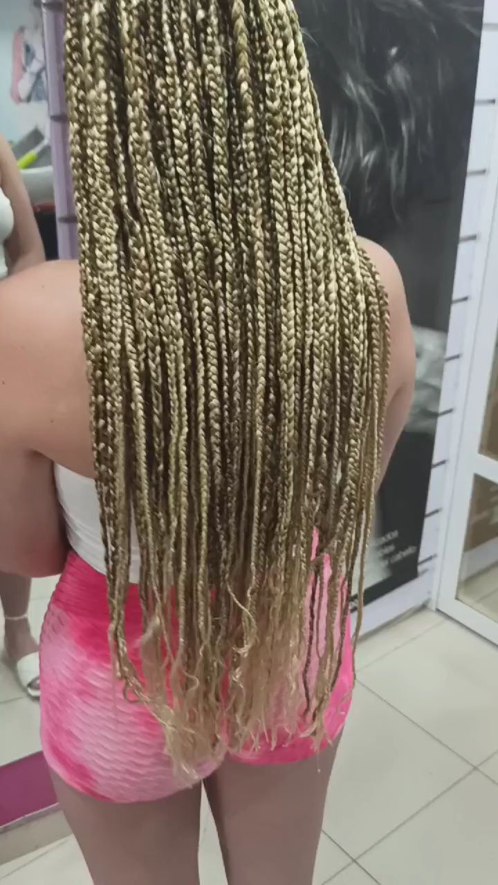 Long golden braids — waist-length finish